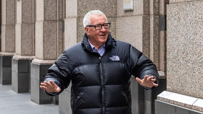 Mike Sheahan arrives at the Collins St law firm. Picture: Jake Nowakowski
