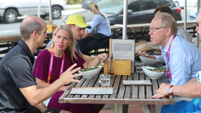 GOLDOC chairman Peter Beattie and Games Minister Kate Jones meet with local cafe owner Michael Furnell in Main Beach. Picture: Alex Coppel