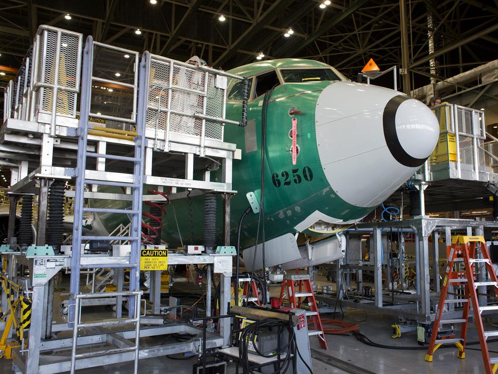 The nose of a Boeing Co. 737 MAX 9 jetliner sits on the production line. Suspicion has fallen on a confused flight-safety AI, with the power to over-ride pilots, as being the cause of recent fatal crashs.