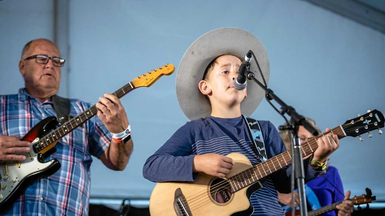 MUSTER MILESTONE: Gayndah's nine-year-old Noah Coulson stepped on a Gympie Muster stage for the first time in 2018, alongside his grandfather Dr Geoff Walden. Picture: Leeroy Todd