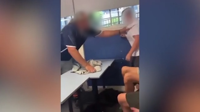 Teacher charged after wild classroom brawl