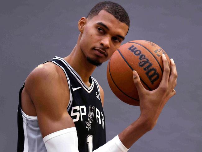 SAN ANTONIO, TX – OCTOBER 02: Victor Wembanyama #1 of the San Antonio Spurs poses for photographs during San Antonio Media Day at 21 Spurs Lane on October 2, 2023 in San Antonio, Texas. NOTE TO USER: User expressly acknowledges and agrees that, by downloading and or using this photograph, User is consenting to the terms and conditions of the Getty Images License Agreement. Ronald Cortes/Getty Images/AFP (Photo by Ronald Cortes / GETTY IMAGES NORTH AMERICA / Getty Images via AFP)