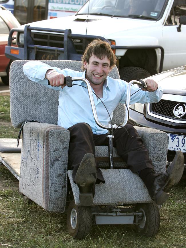 The aftermath of the Geelong Cup - Luke Hopgood with his lawn mower-run lounge chair ride home