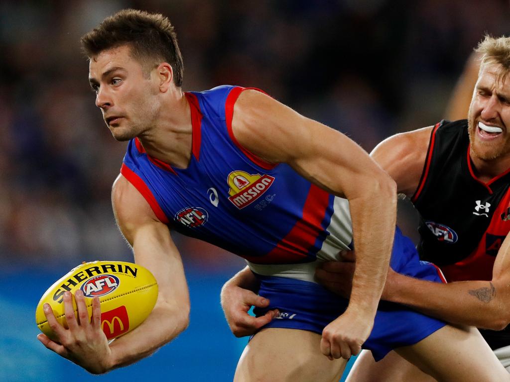 In another world, Josh Dunkley might have been wearing an Essendon jumper, instead of dominating the Bombers. Picture: AFL Photos/Getty Images