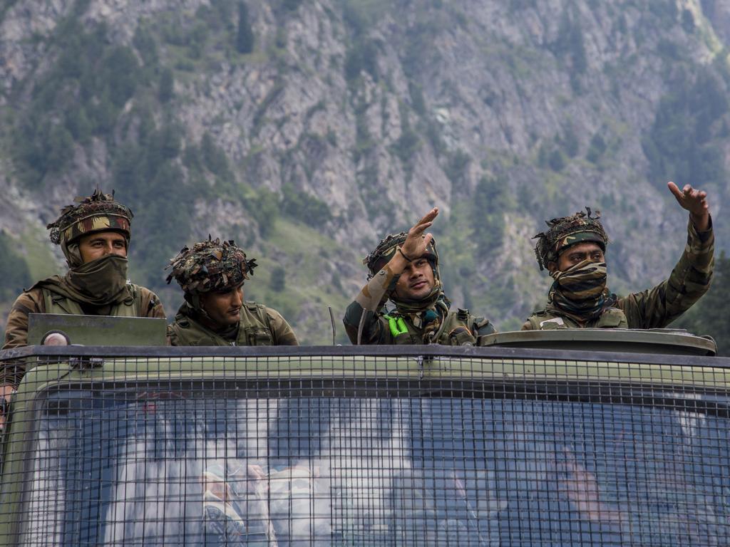 Indian army convoy carrying reinforcement and supplies, drive towards Leh, on a highway bordering China. Picture: Yawar Nazir/Getty Images