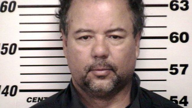 This image provided by the Cuyahoga County Sheriff's office shows the Cuyahoga County Corrections Center booking photo of Ariel Castro, 52, after he was ordered to be held on $8 million bail Thursday, May 9, 2013, in Cleveland. Castro, a former school bus driver, is accused of imprisoning three young women and beating them repeatedly over a decade in Cleveland. (AP Photo/Cuyahoga County)