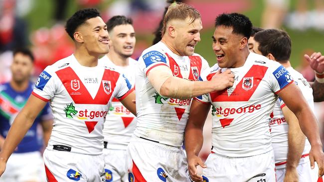 SYDNEY, AUSTRALIA - MAY 21: Jack De Belin of the Dragons congratulates Francis Molo of the Dragons as he celebrates with his team mates after scoring a try during the round 11 NRL match between the St George Illawarra Dragons and the New Zealand Warriors at Netstrata Jubilee Stadium, on May 21, 2022, in Sydney, Australia. (Photo by Mark Kolbe/Getty Images)