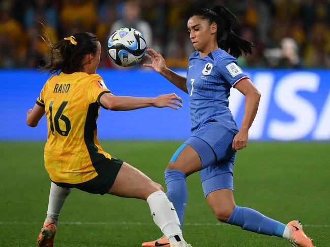 France's defender #07 Sakina Karchaoui fights for the ball with Australia's forward #16 Hayley Raso during the Australia and New Zealand 2023 Women's World Cup quarter-final football match between Australia and France at Brisbane Stadium in Brisbane on August 12, 2023. (Photo by FRANCK FIFE / AFP)