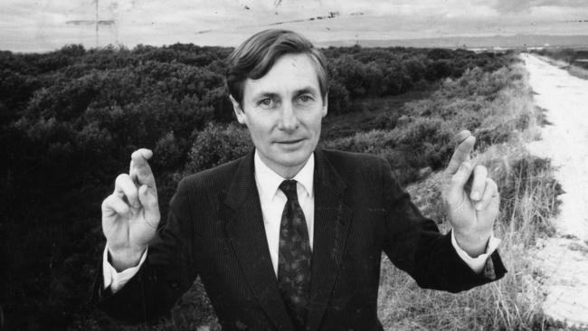 SA premier John Bannon keeps his finger crossed while inspecting the proposed Multi-Function Polis site at Gillman in 1990.