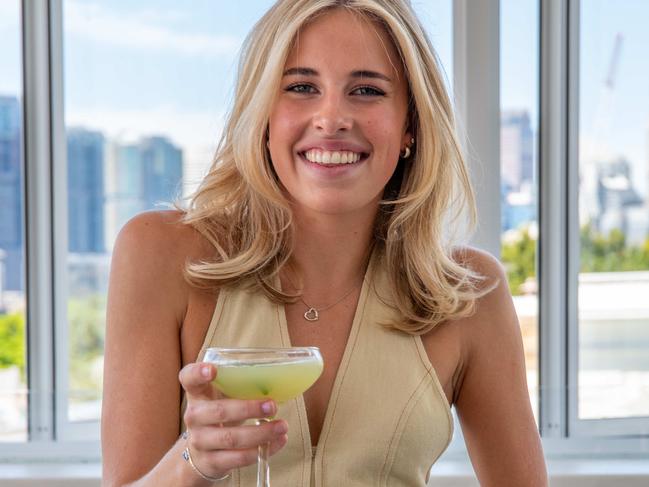 Mia Reilly Poses With A Cocktail At The Newly Renovated Roof Top Terrace At The Toxteth Pub In Glebe Friday 19th January. Picture: Thomas Lisson