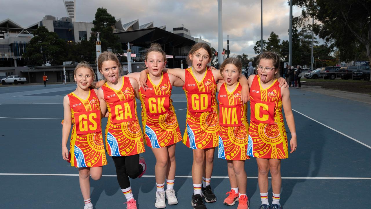 Surf Coast Suns Addis under-11 netball team pull their funniest faces.