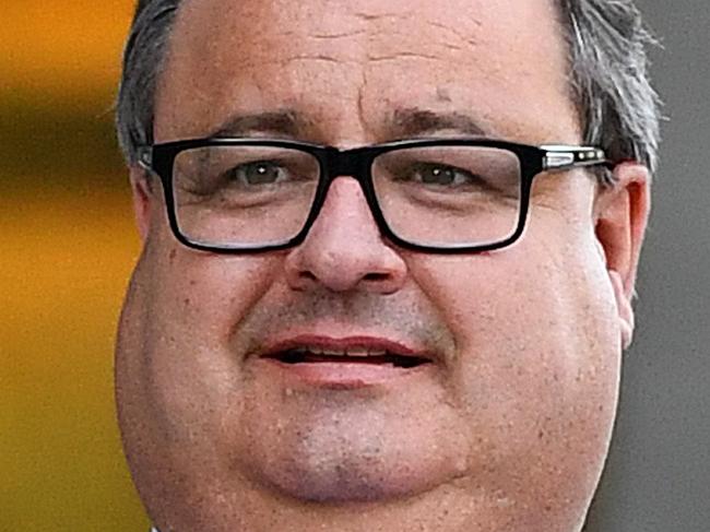 Clive Mensink, the nephew of Clive Palmer, leaves the Supreme Court in Brisbane, Wednesday, April 20, 2016. Mr Mensink Mr Mensink has asked the court to issue an injunction preventing the Queensland Nickel administrators from appointing receivers to three other Palmer nickel companies who were in a joint venture with QN. (AAP Image/Dave Hunt) NO ARCHIVING