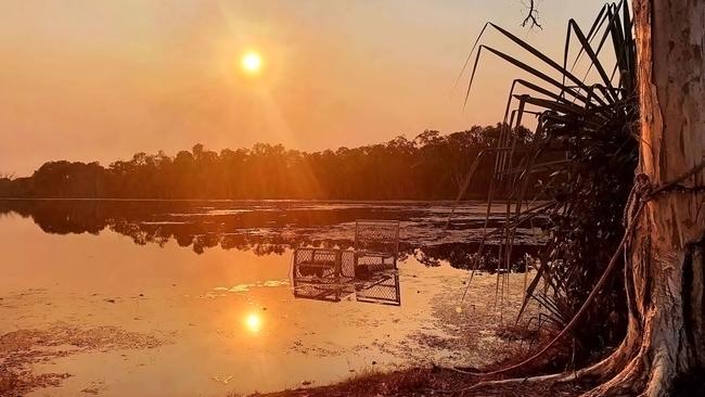 The sun sets on Jabiru Lake by Roger Orford. Northern exposure