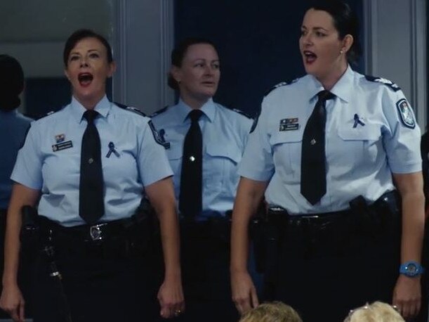 A still from a fun video showing some singing, dancing Queensland Police Officers during an International Women's Day luncheon in 2016. Source: Supplied.