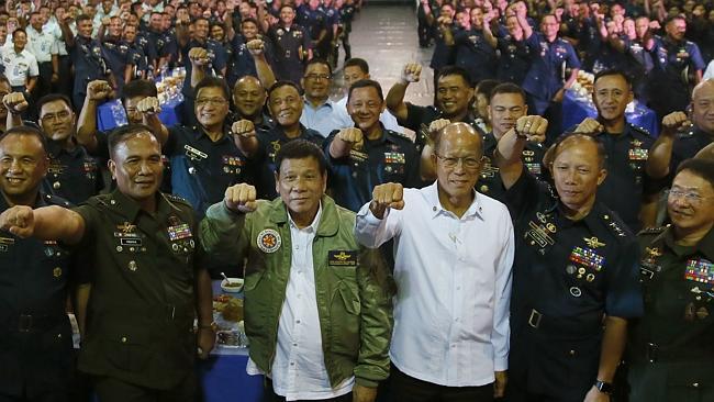 Philippine President Rodrigo Duterte, wearing a green pilot's jacket, at the Philippine Air Force headquarters.