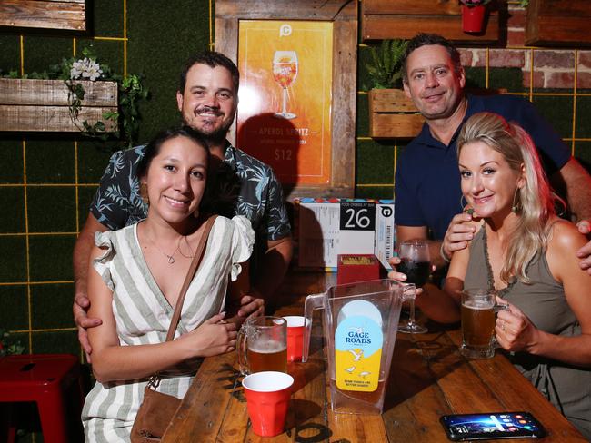 Kyle Lafason, Cynthia Mepute, Alice Whitehead and Joel Feeney saw in the new year together at The Courtyard on the Cairns Esplanade. Picture: Brendan Radke