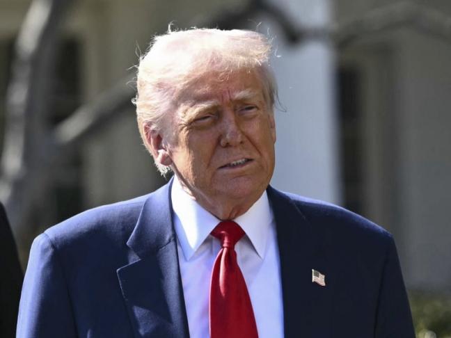 President Donald Trump, with Tesla CEO Elon Musk, and his son X Ãâ  A-Xii, arrive on the South Lawn of the White House Tuesday, March 11, 2025, in Washington. (Pool via AP)