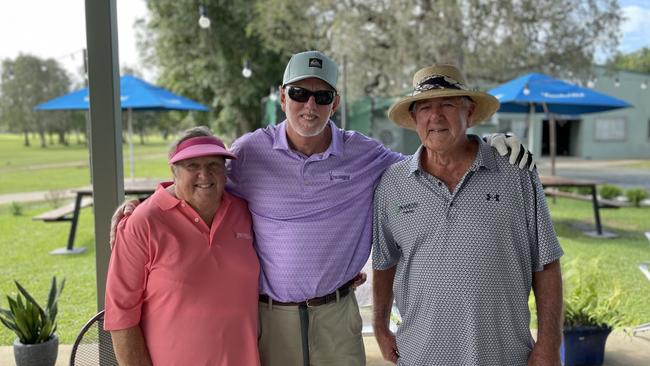 Fay Milne, Brad Vloedmans, and Harry Milne at Proserpine Golf Club's 100 year golf weekend.