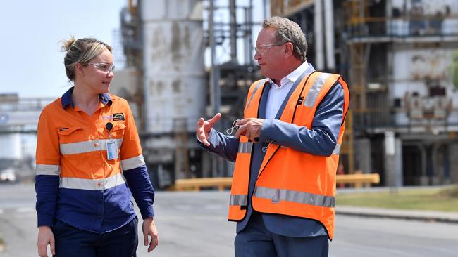 Incitec Pivot worker Christie Rossi chats with Fortescue Future Industries’ Andrew Forrest at Gibson Island. Picture: AAP