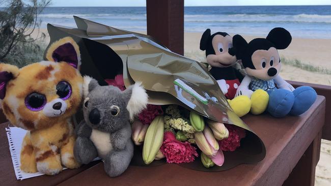 Flowers and teddies left at Surfers Paradise following the discovery of a nine-month-old baby's body. Picture: Glenn Hampson