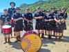 Sun, sand, kilts, and bagpipes: Band’s unusual tour stop