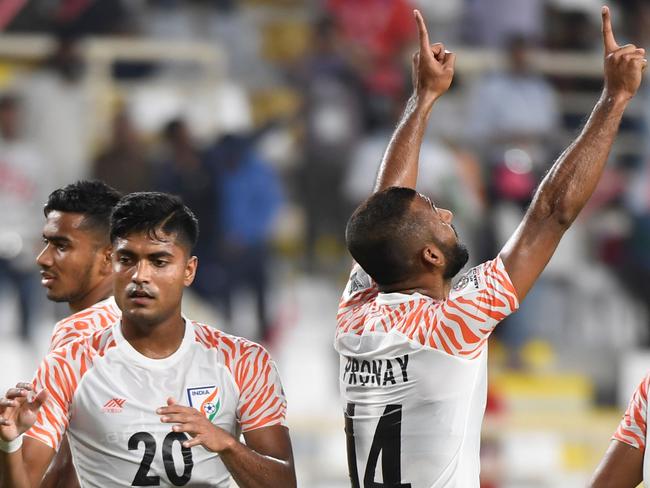 India's forward Sunil Chhetri (2nd-L) celebrates after scoring a goal during the 2019 AFC Asian Cup Group A football game between Thailand and India at the Al Nahyan Stadium stadium in Abu Dhabi on January 6, 2019. (Photo by Khaled DESOUKI / AFP)