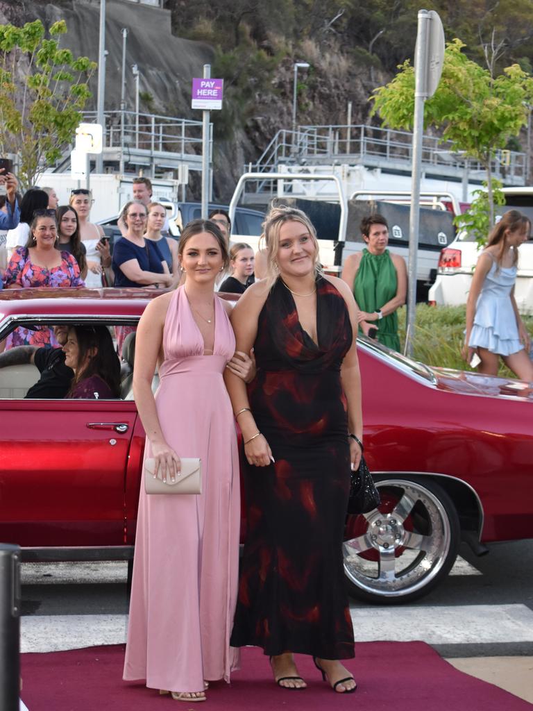 Priyah McDonald and Evie Jones at the Proserpine State High School formal at Shute Harbour Marine Terminal on November 15, 2023. Photo: Zoe Devenport