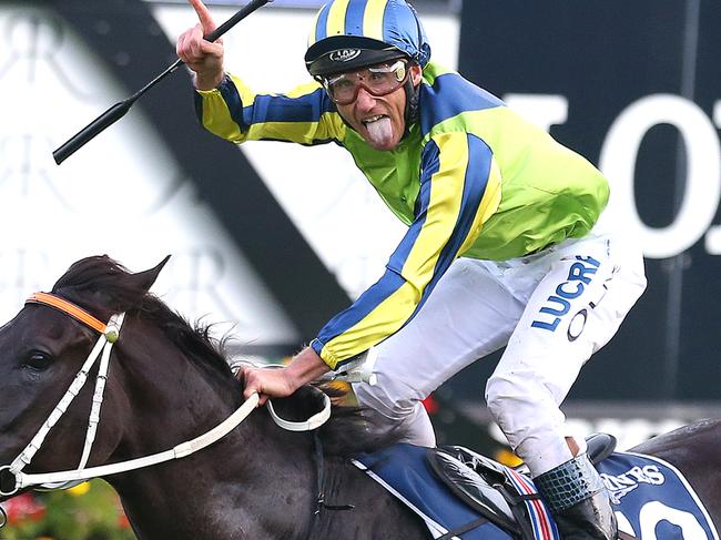 Jockey Damien Oliver on Lucia Valentina celebrates as they win the Longines Queen Elizabeth Stakes race during The Championships - Day 2 Longines Queen Elizabeth Stakes Day at Royal Randwick racecourse in Sydney, Saturday, April 9, 2016. (AAP Image/David Moir) NO ARCHIVING, EDITORIAL USE ONLY