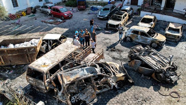 Photos taken at the site of the blast show a very shallow crater in the parking lot outside, and that the hospital compound’s buildings hadn’t sustained major damage. Picture: AFP