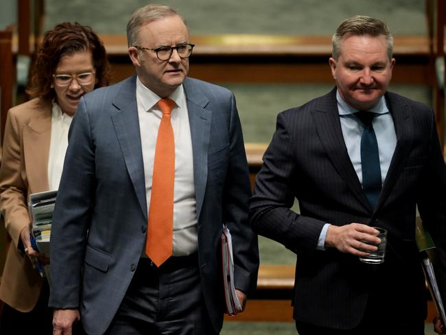 CANBERRA, AUSTRALIA - AUGUST 22: Prime Minister Anthony Albanese with Minister for Climate Change and Energy of Australia Chris Bowen (R) during Question Time in the House of Representatives at Australian Parliament House on August 22, 2024 in Canberra, Australia. Pressure is building on the Albanese government on a number of fronts, but cost of living pressures are top among them and may prove to be a damaging political liability in the months ahead as Peter Dutton gets the opposition ready for next year's election season. (Photo by Tracey Nearmy/Getty Images)