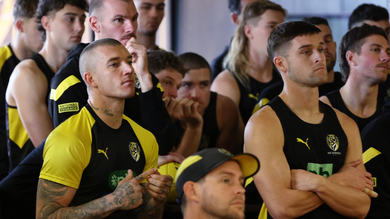 Dustin Martin, left, listens in to Damien Hardwick’s press conference on Tuesday. Picture: Michael Klein