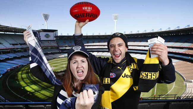 Cats fan Renee Bennett and Tigers fan Liam Dimattina are looking forward to the clash. Picture: David Caird