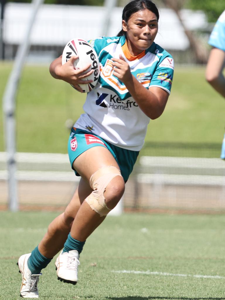 Mariah Tihopu runs hard towards the Cutters' defence in the Queensland Rugby League (QRL) Under 19 Women's match between the Northern Pride and the Mackay Cutters, held at Barlow Park. Picture: Brendan Radke