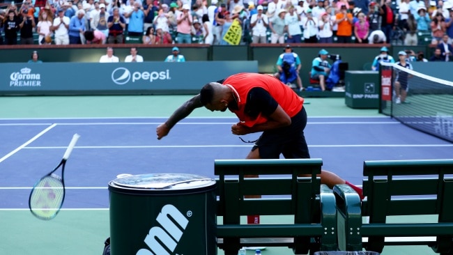 The 26-year-old smashing a racquet to the ground in frustration. Picture: Clive Brunskill/Getty Images