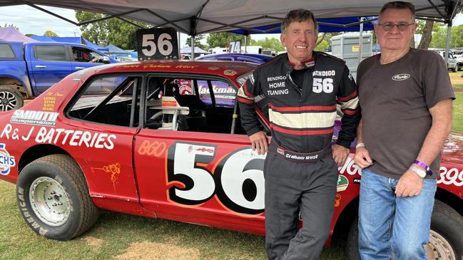 Graham West, VIC, and Des O'Shea, Bundaberg. Graham proudly drives the older car on the field.