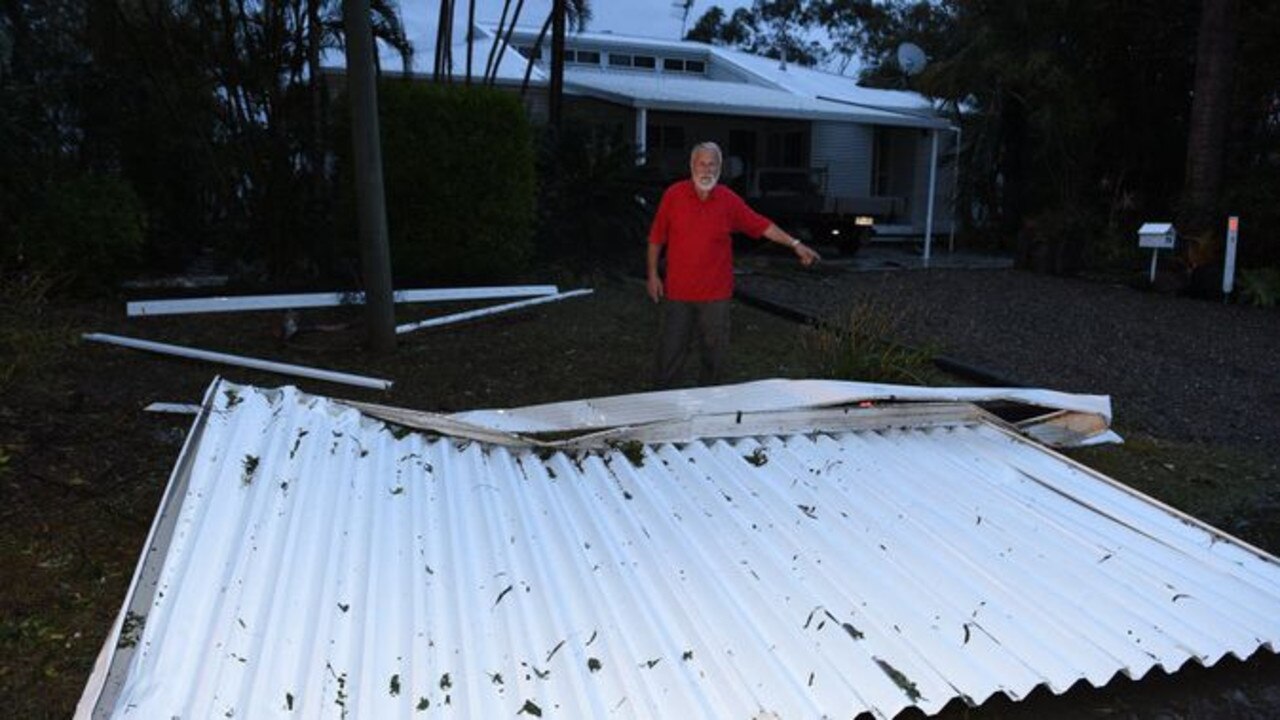 Paul Widmer in his front yard where the patio blew over his house and landed on the side of Maryborough Biggenden Rd. Picture: Alistair Brightman