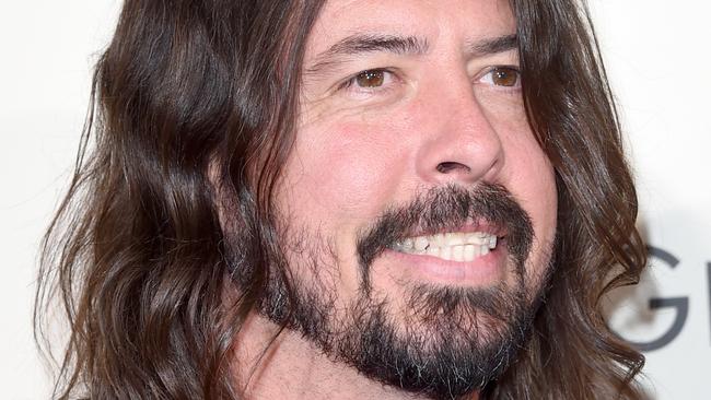 Dave Grohl of the rock band Foo Fighters got his eight-year-old daughter on stage to play the drums in Iceland. Picture: Jason Merritt