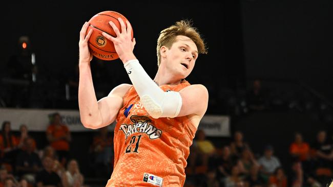 CAIRNS, AUSTRALIA - OCTOBER 19:  Sam Waardenburg  of the Taipans catches a rebound during the round five NBL match between Cairns Taipans and Illawarra Hawks at Cairns Convention Centre, on October 19, 2024, in Cairns, Australia. (Photo by Emily Barker/Getty Images)