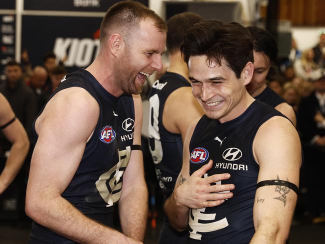 MELBOURNE, AUSTRALIA - AUGUST 12: Sam Docherty of the Blues and Zac Fisher of the Blues celebrate winning the round 22 AFL match between Carlton Blues and Melbourne Demons at Melbourne Cricket Ground, on August 12, 2023, in Melbourne, Australia. (Photo by Daniel Pockett/Getty Images)