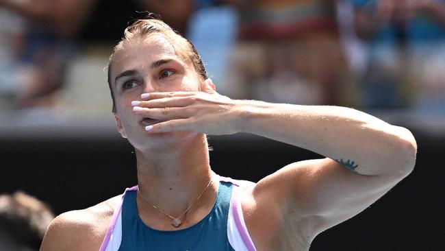 Belarus' Aryna Sabalenka seals it with a kiss.