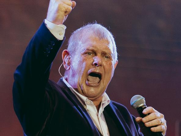 John Farnham and Olivia Newton-John perform during Fire Fight Australia at ANZ Stadium on February 16, 2020 in Sydney, Australia.