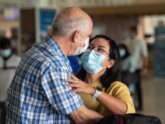 Emotional scenes at Brisbane International Airport. Picture: Brad Fleet