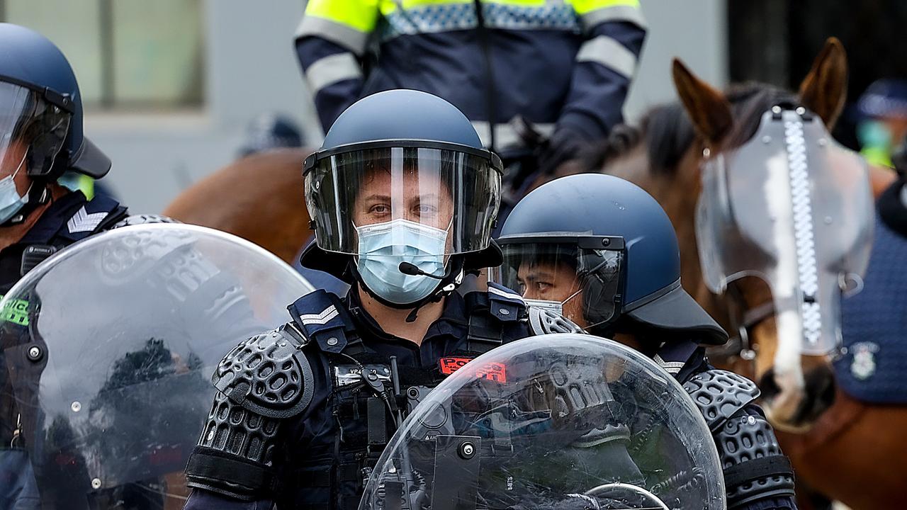 Riot Squad police awaited any anti-vaccine and anti-lockdown protesters as they marched through Melbourne's CBD. Picture: NCA NewsWire/Ian Currie