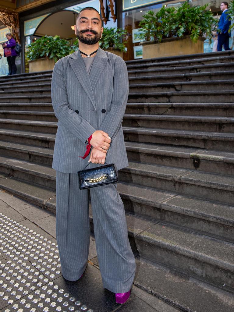 They wore a $60 charcoal suit from Target paired with designer purple heels. Picture: NCA NewsWire / Christian Gilles