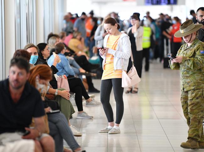 A large number of people were flying out of Adelaide Airport to return to their home states and territories. Picture: NCA NewsWire/David Mariuz