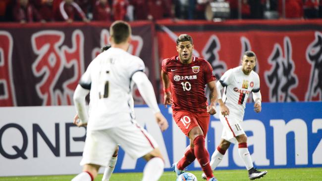 Brazilian football star Givanildo Vieira de Sousa, right, better known as Hulk, plays for China's Shanghai SIPG.