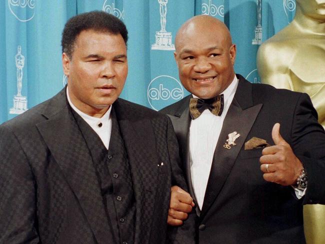 Former heavyweight boxers Muhammad Ali (L) & George Foreman on stage during Academy Awards ceremony 24/03/97. Boxing