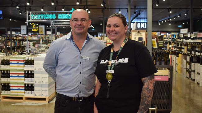 Dan Murphy's area manager Darren Lowe and Norman Gardens store manager Tegan Dekker. Picture: Aden Stokes