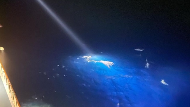 One of the bright lights that were used on Wednesday to search for the man. Passengers on board described the conditions as "rough and obviously pitch black". Picture: Instagram/cruisingtravellers