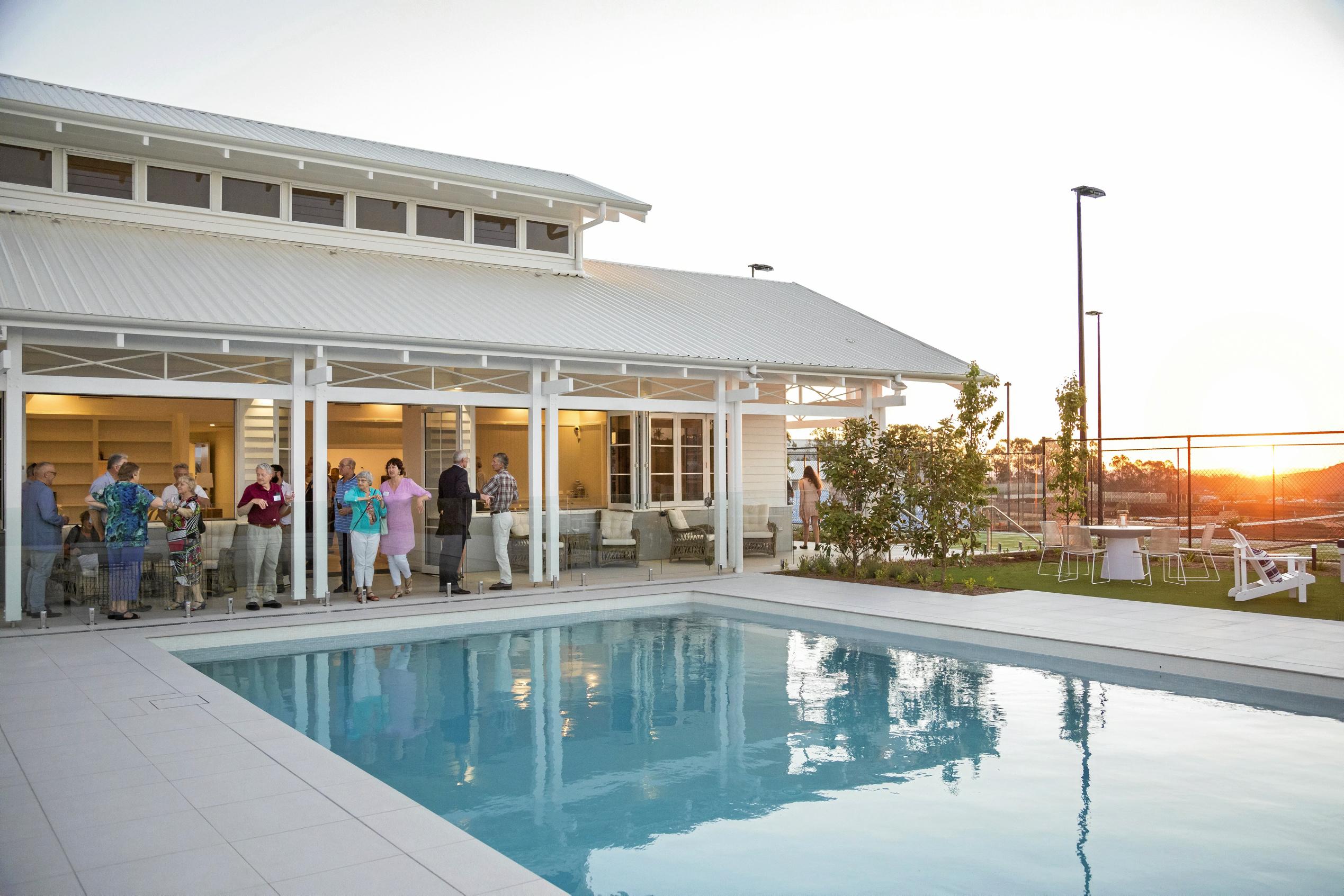 Guests of Pradella Property Ventures inspect the new summer house at the upcoming $71 million Seachange retirement in Harristown. Picture: DK Photography